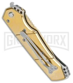Super Knife Croc Automatic Knife Stainless Gold W/ Gold Inlay - Gold Serr 6 Super Knife Croc Automatic Knife Stainless Gold W/ Gold Inlay - Gold Serr -Gerber Knives Store Super Knife Croc Auto Stainless Gold Gold Inlay Gold Serr GX 34967 jr side large